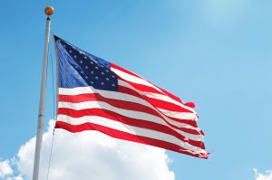USA flag against a cloudy sky